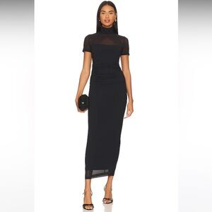 Dominique Midi Dress in Black
Amanda Uprichard